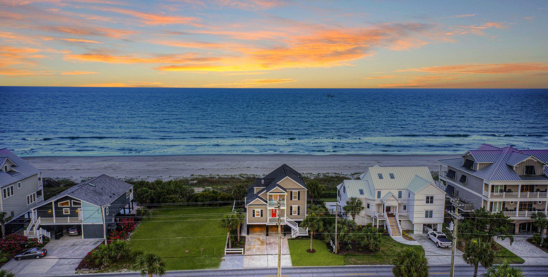 Aerial view of the oceanfront home at sunrise