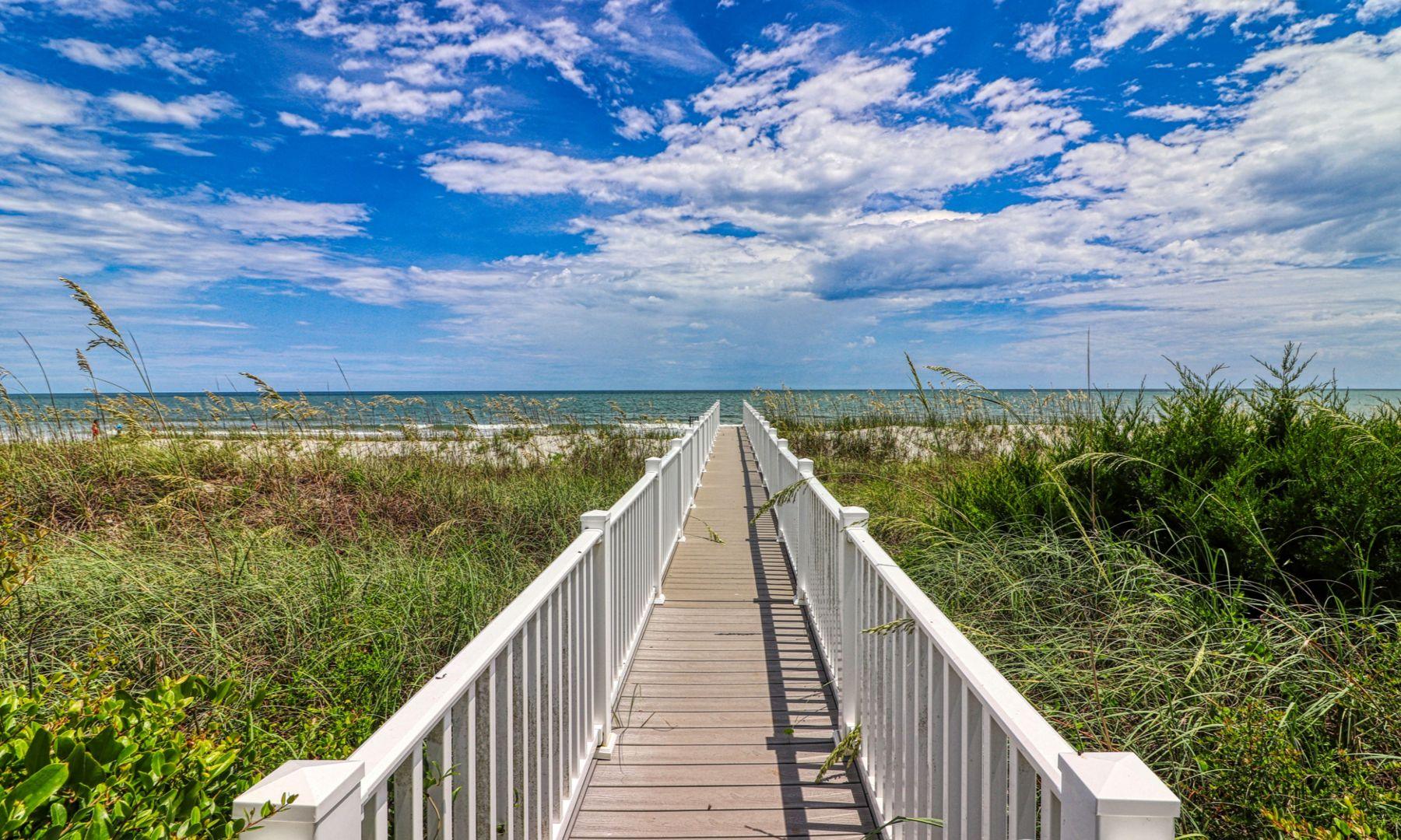 Private boardwalk through the dunes to the beach
